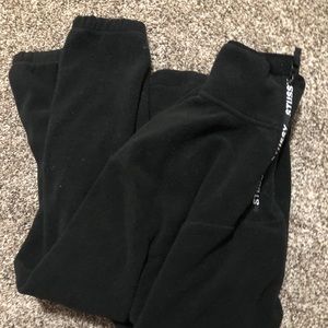 STUSSY black pullover quarter zip